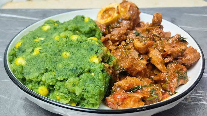 A traditional Kikuyu dish made from maize, beans, potatoes, and greens, served with a rich beef stew
